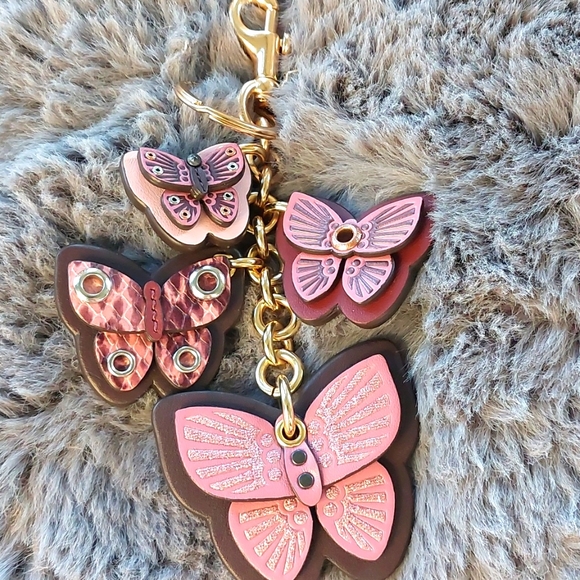 Coach Handbags - Coach Butterfly bag charm retired keychain glovetanned leather 💕